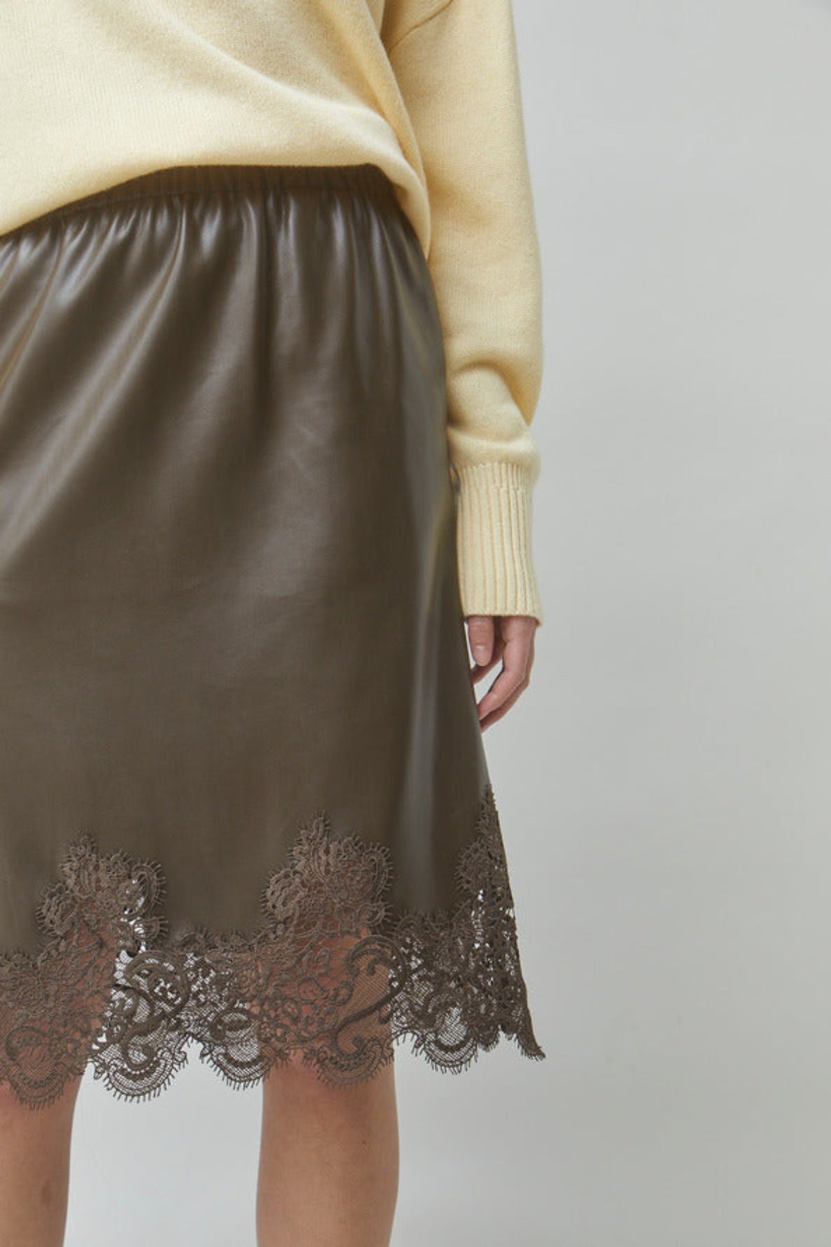 FLOW Khaki faux leather skirt with lace details