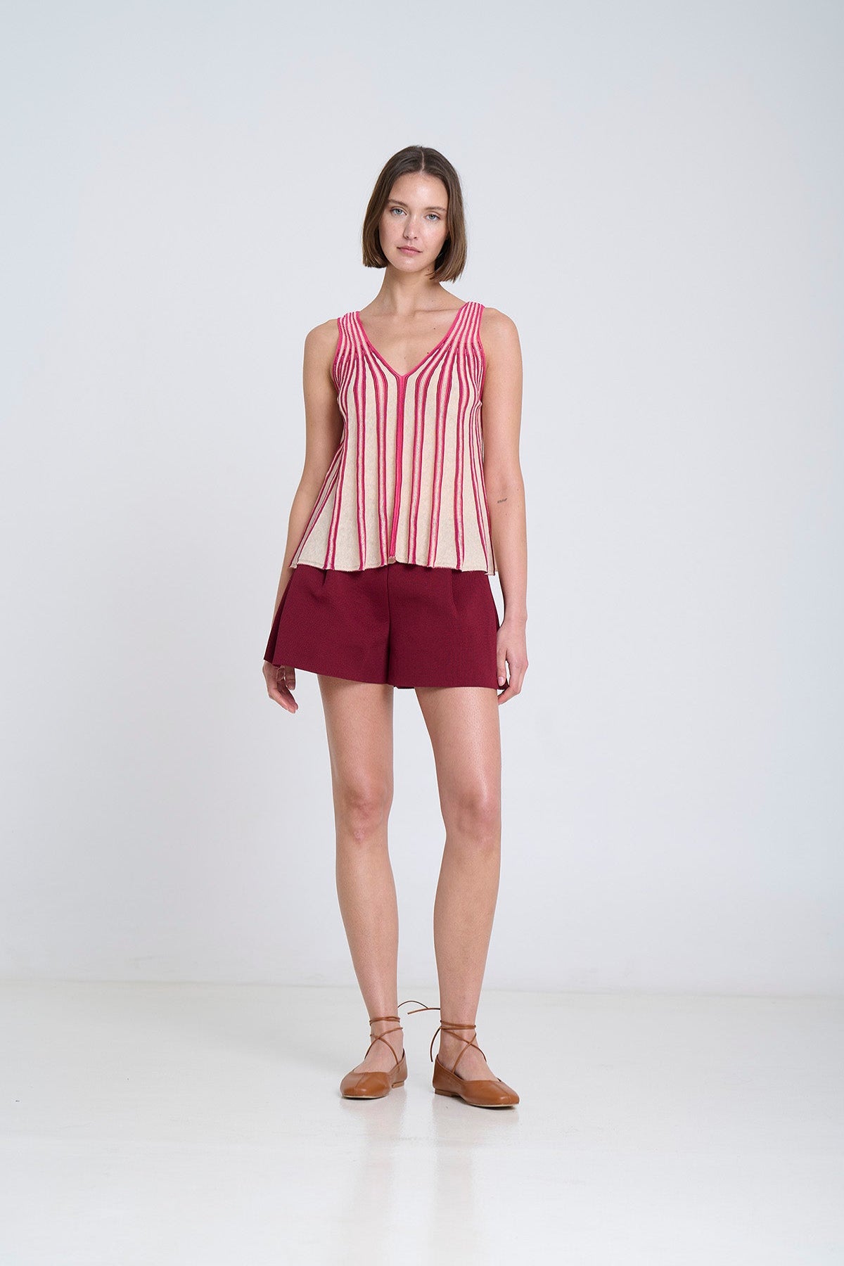 Radial knit top