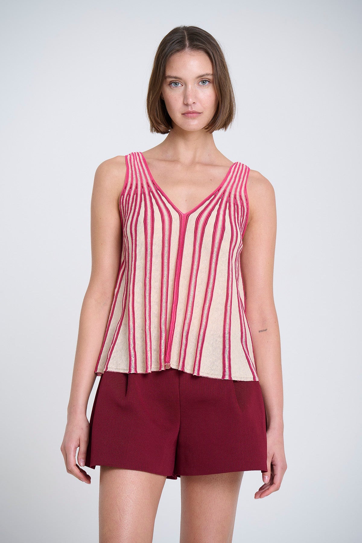 Radial knit top